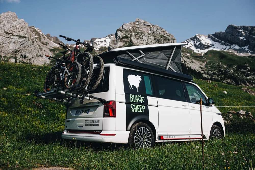 Black Sheep VW California campervan with mountain bikes in the French Alps
