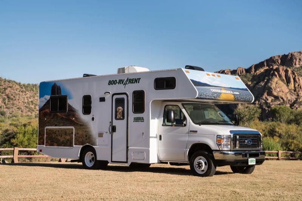 Cruise Canada Ford-based Class C motorhome parked by red-rock scenery
