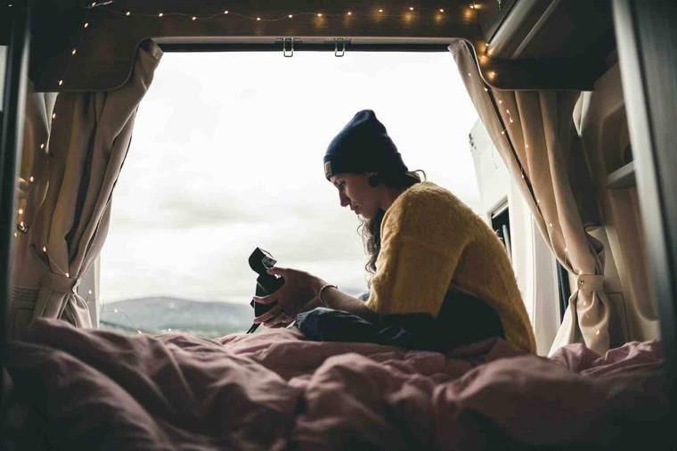 Travellers enjoying a campervan trip together
